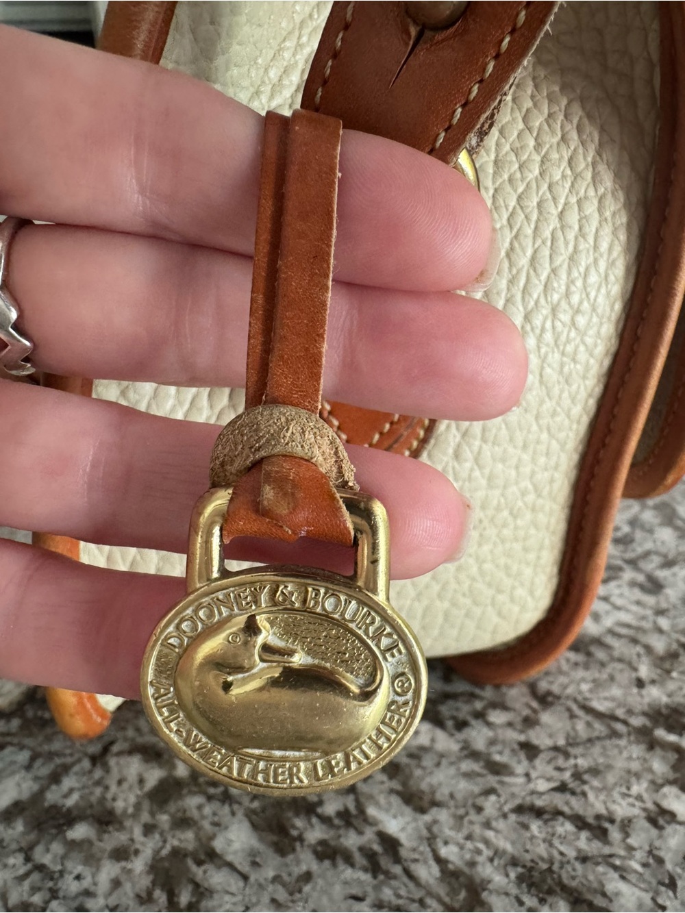 Dooney & Bourke Cream and Tan Pebbled Leather Crossbody - Picture 4 of 9